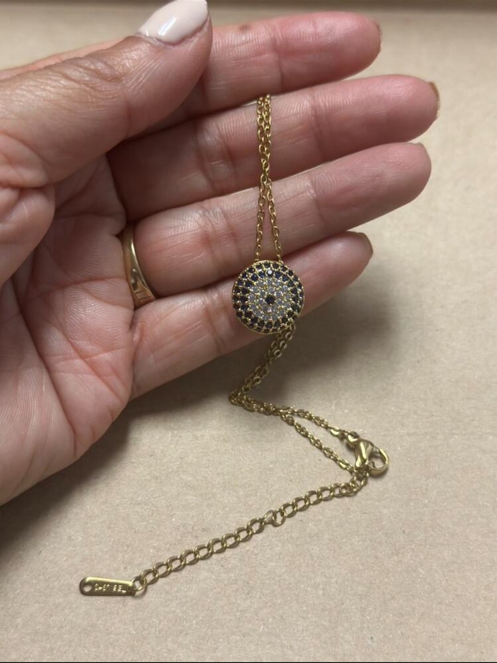 Gold Circle Pavé Necklace with Blue and Clear Stones - Picture 2 of 3